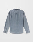 Blue denim Volcom shirt on a light gray background - available at Mango Surfing.
