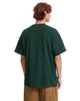 Person wearing a dark green t-shirt on a white background