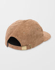 Brown corduroy cap with a gold buckle on a light gray background