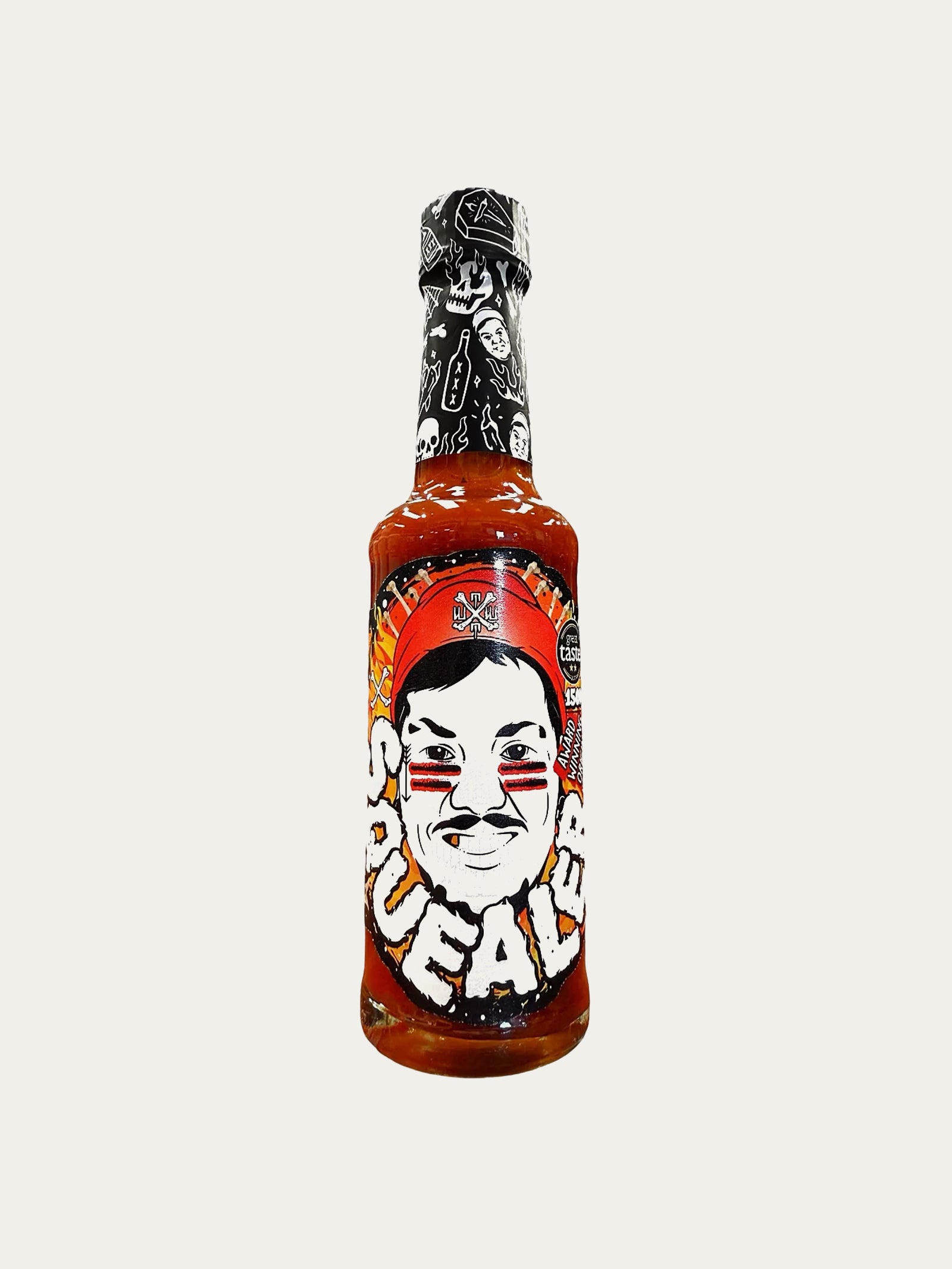 Hot sauce bottle with a unique label on a white background