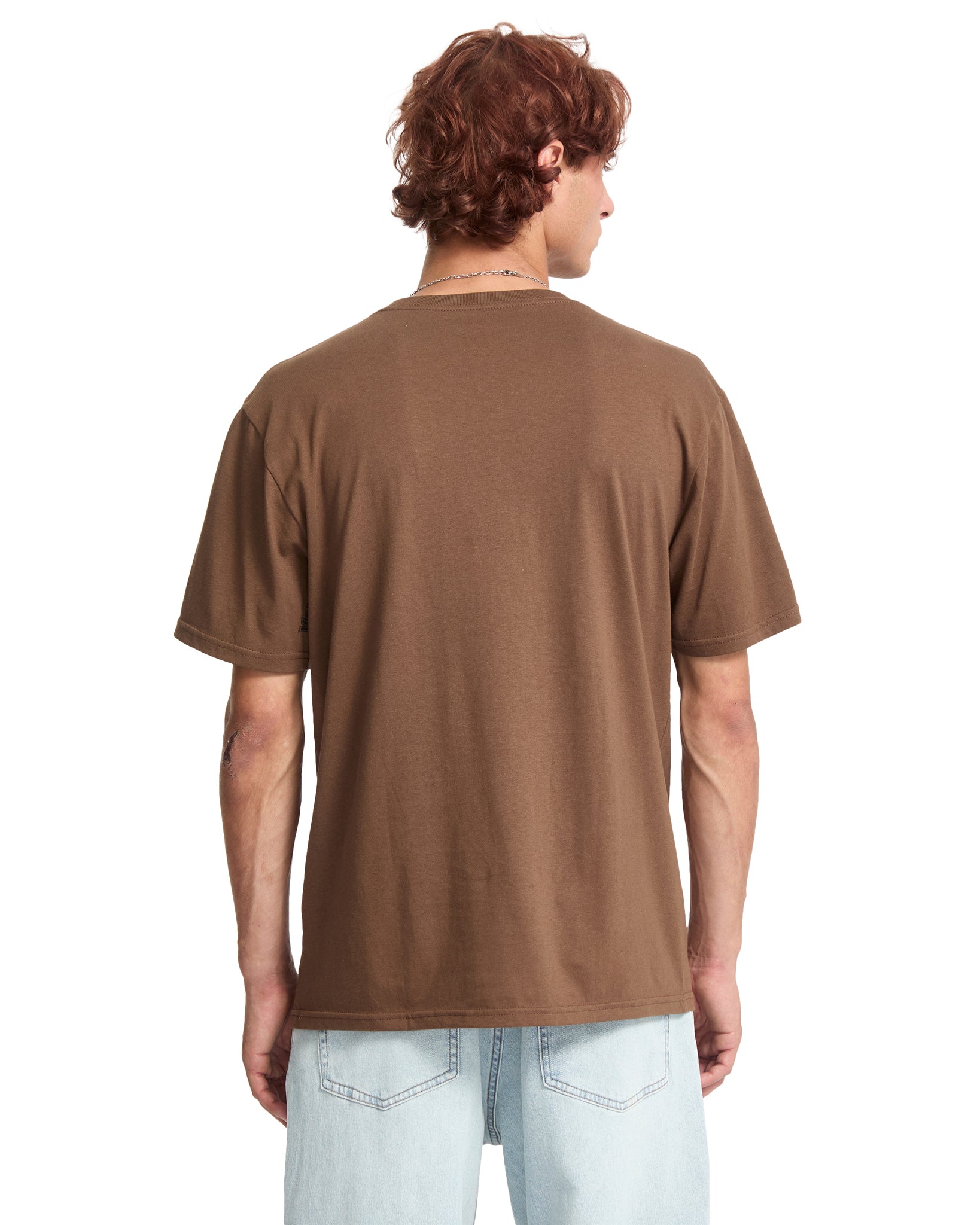 Man wearing a brown t-shirt on a white background
