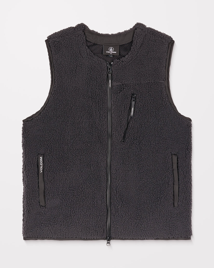 Black fleece vest with zippers on a light gray background