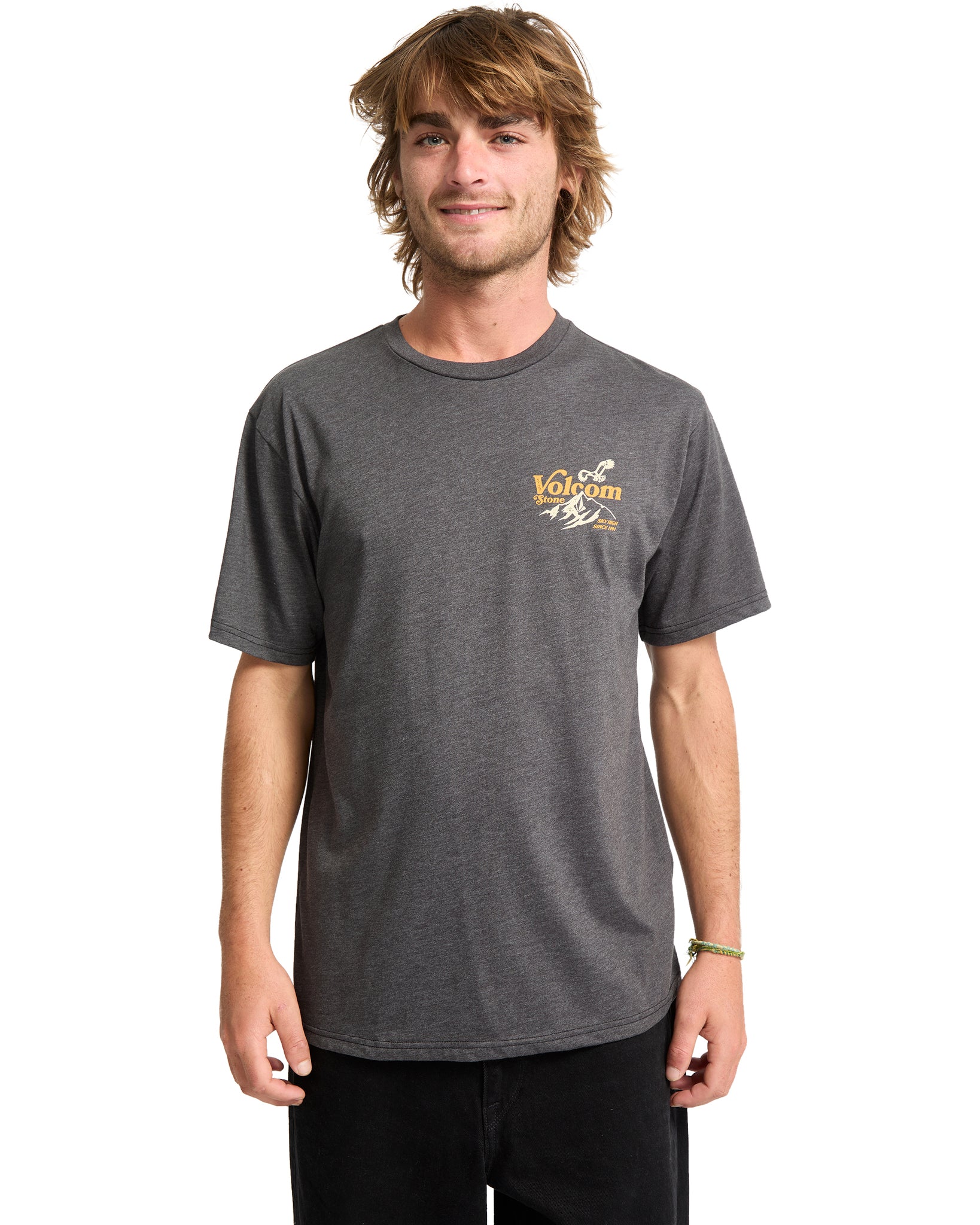 Man wearing a gray t-shirt with a logo on a white background