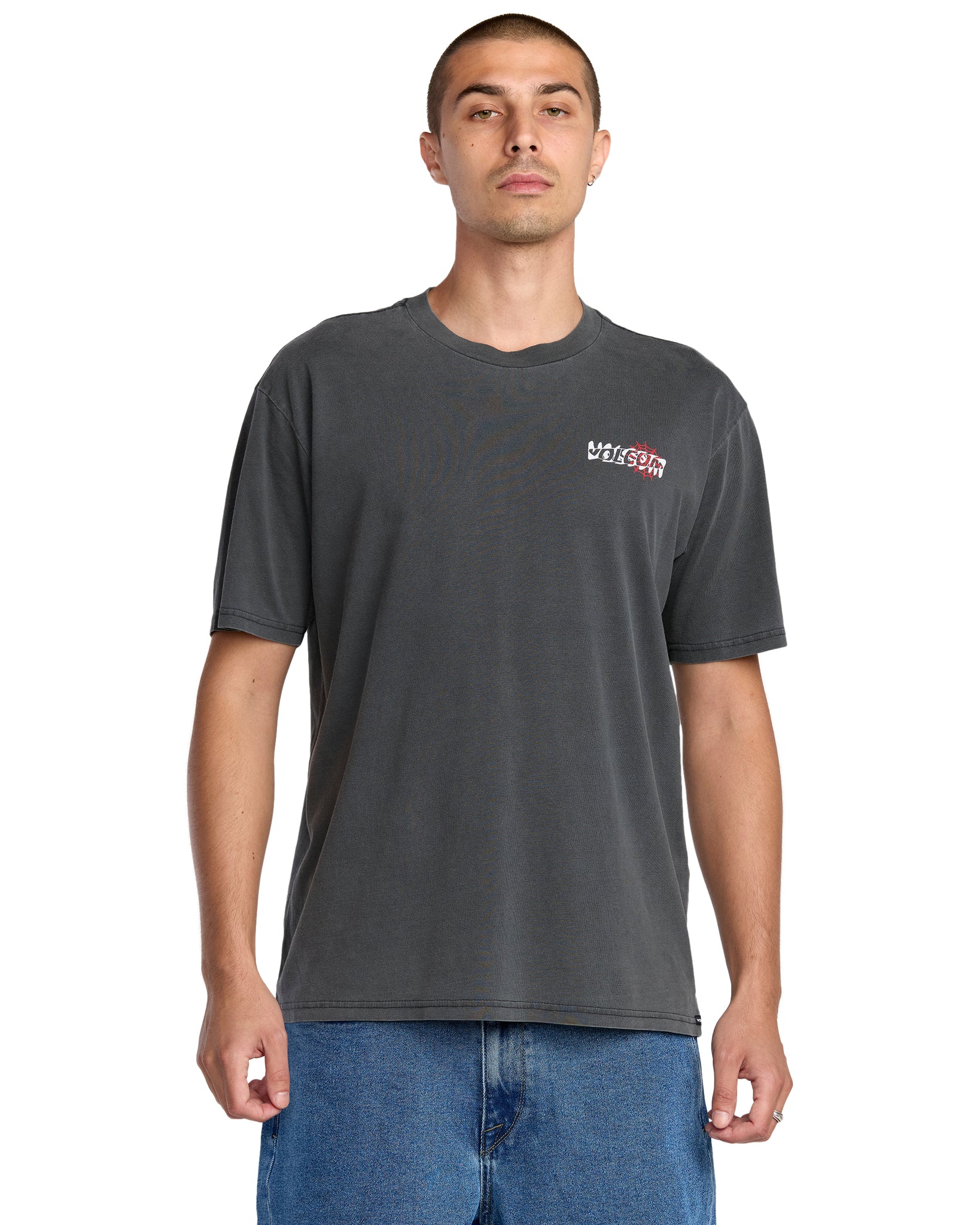 Man wearing a gray t-shirt with a logo on a white background