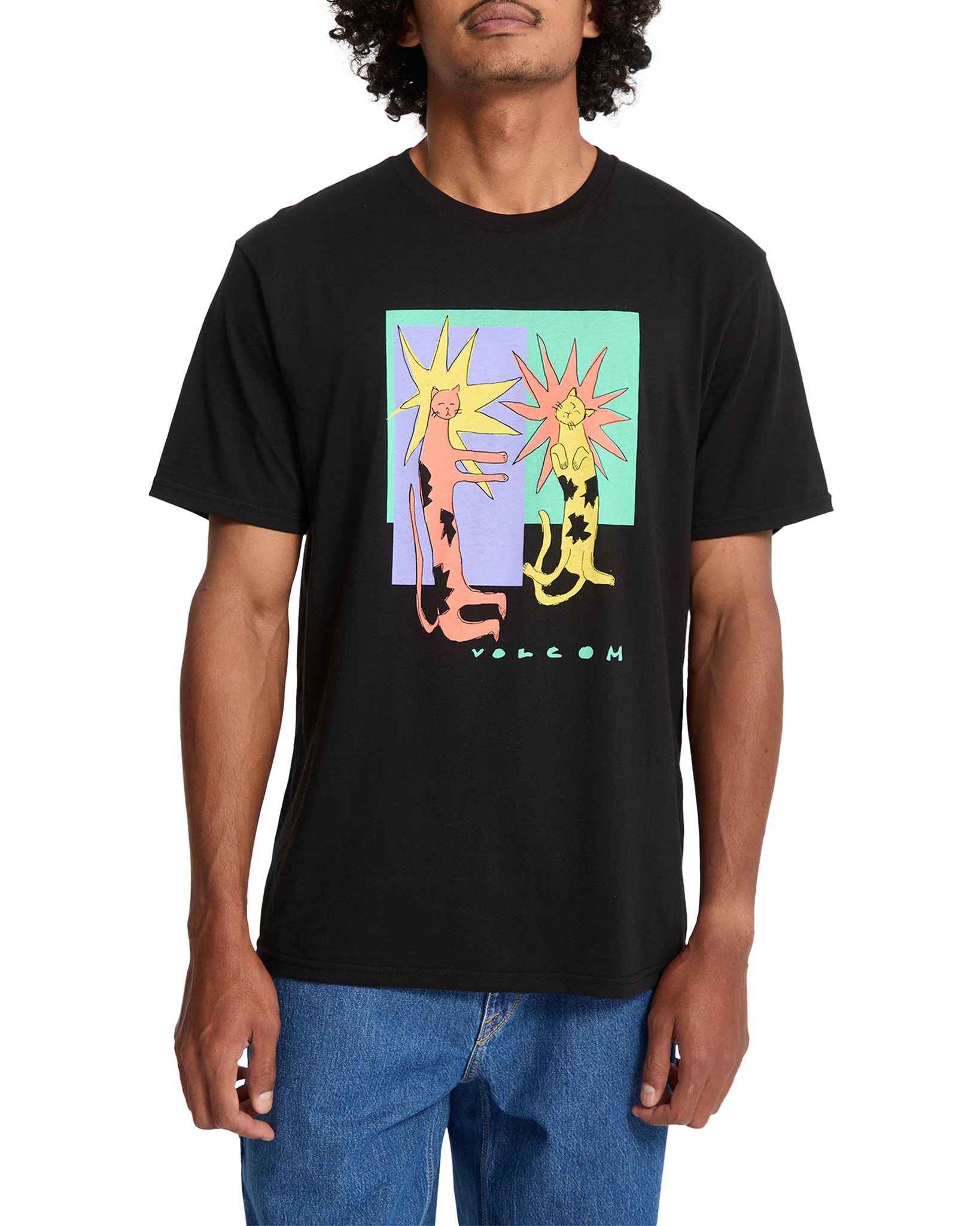 Person wearing a black t-shirt with colorful graphic design on a white background