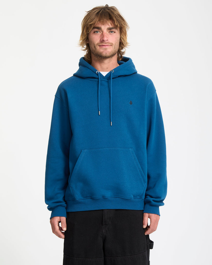 Person wearing a blue hoodie on a white background