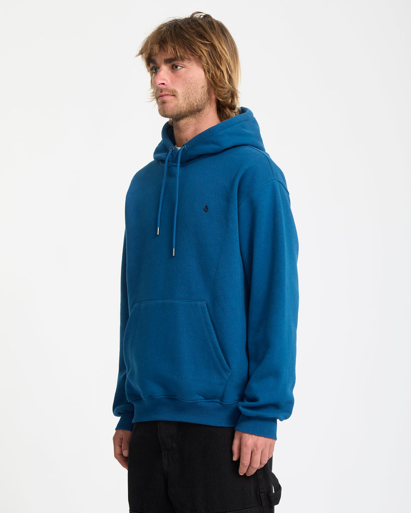 Man wearing a blue hoodie on a white background