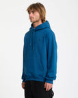 Man wearing a blue hoodie on a white background