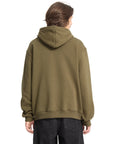 Person wearing a green hoodie from behind on a white background
