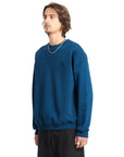 Man wearing a blue sweatshirt on a white background