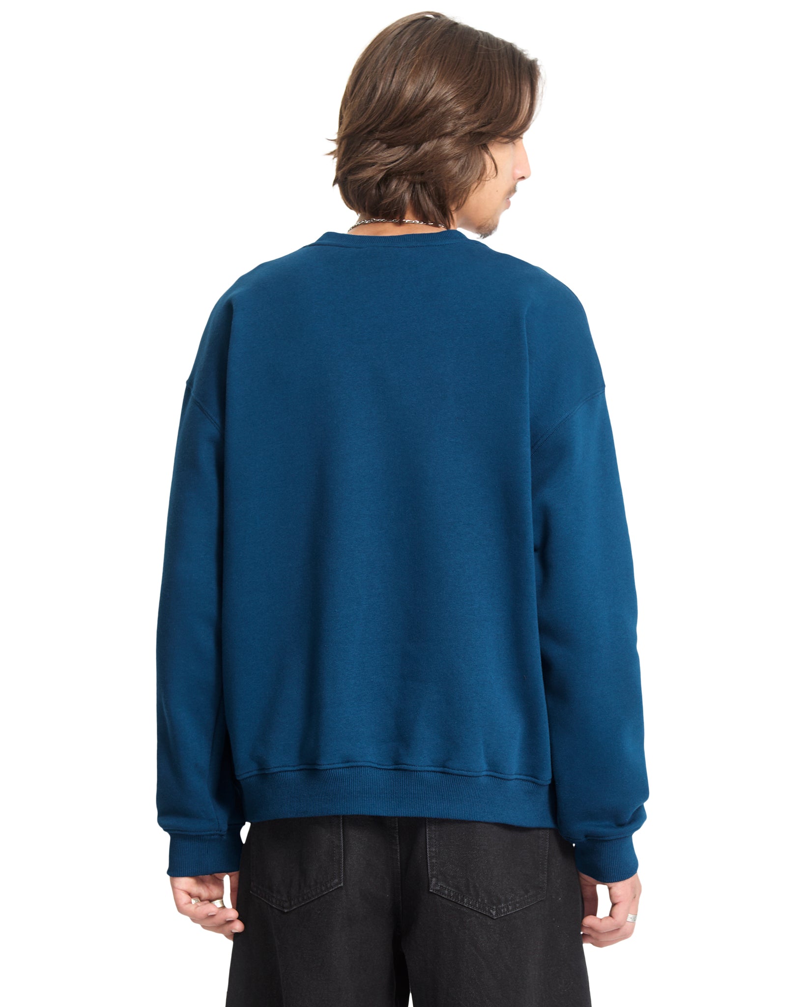 Person wearing a blue sweatshirt on a white background