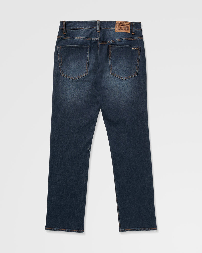 Back view of dark blue jeans on a white background