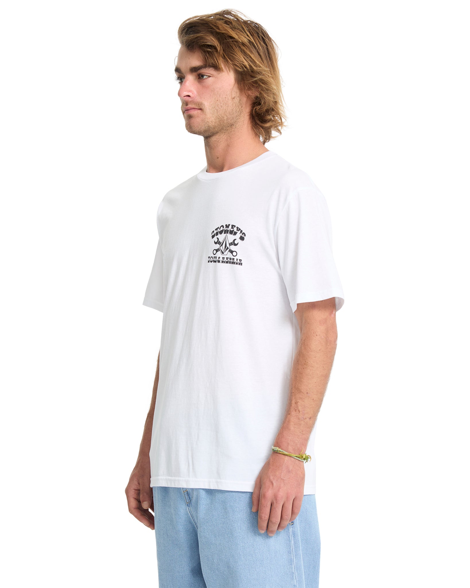 Man wearing a white t-shirt with a logo on a white background