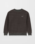 Dark gray sweatshirt with a small logo on a light gray background
