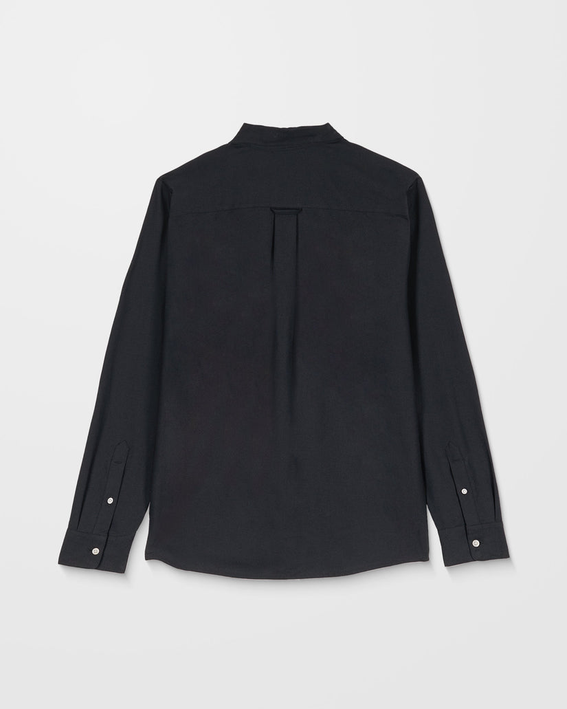 Black shirt on a light gray background